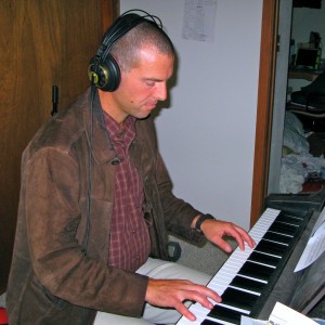 Russ Parsons plays piano for Bob Wire's Off White Christmas album.