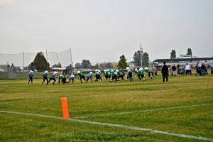 The Little Grizzlies take the field in a scrimmage.