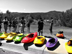 Jason Shreder teaches a group of new kayakers how to paddle.