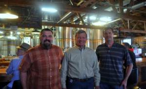 Ryan Newhouse and Alan McCormick with Senator Max Baucus.