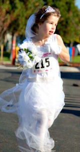 A young diva runs in the Missoula Diva Day 5K.